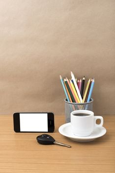 coffee,phone,car key and heart on wood table background