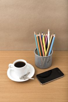 coffee,phone,key and pencil on wood table background