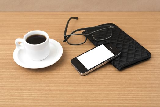 coffee,phone,eyeglasses and wallet on wood table background
