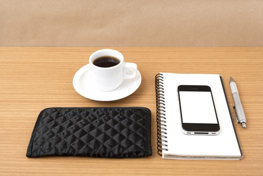 coffee,phone,notepad and wallet on wood table background