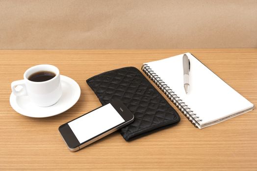 coffee,phone,notepad and wallet on wood table background