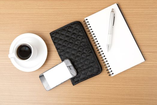 coffee,phone,notepad and wallet on wood table background