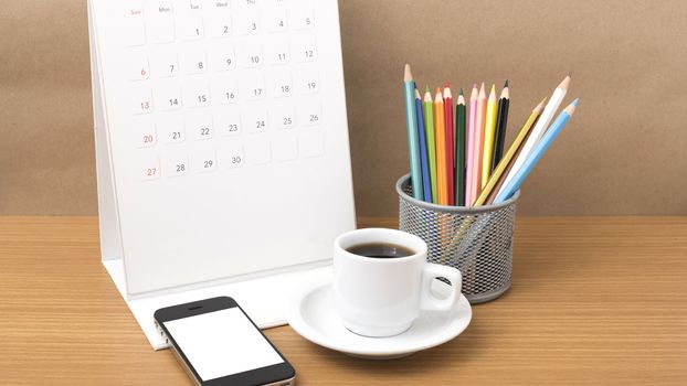 coffee,phone,calendar and color pencil on wood table background