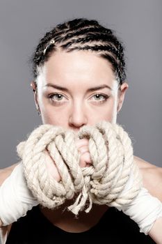 portrait of a girl with rope on her hands