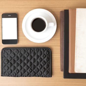 coffee,phone,stack of book and wallet on wood table background