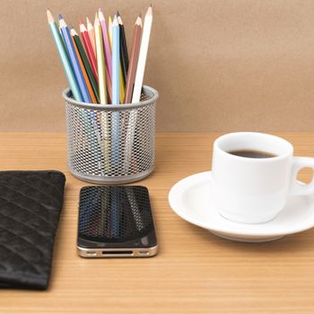 coffee,phone,wallet and color pencil on wood table background