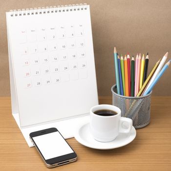 coffee,phone,calendar and color pencil on wood table background