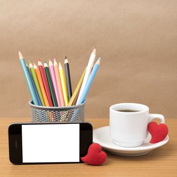 coffee,phone,color pencil and heart on wood table background