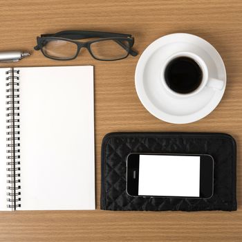 coffee,phone,eyeglasses,notepad and wallet on wood table background