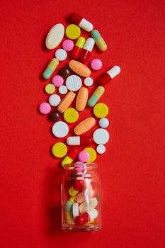 Close up of many colorful pills. Top view with copy space. Medicine concept