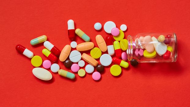 Close up of many colorful pills. Top view with copy space. Medicine concept