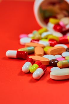 Close up of many colorful pills. Top view with copy space. Medicine concept. Shallow dof