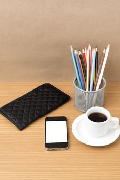 coffee,phone,wallet and color pencil on wood table background