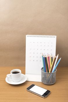 coffee,phone,calendar and color pencil on wood table background