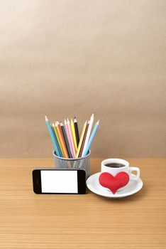 coffee,phone,color pencil and heart on wood table background