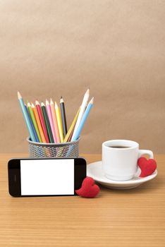 coffee,phone,color pencil and heart on wood table background