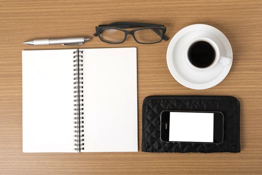 coffee,phone,eyeglasses,notepad and wallet on wood table background