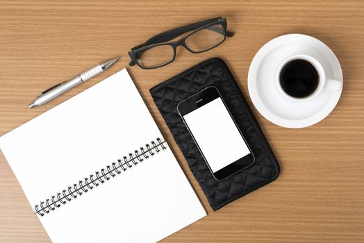 coffee,phone,eyeglasses,notepad and wallet on wood table background