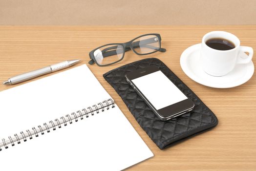 coffee,phone,eyeglasses,notepad and wallet on wood table background