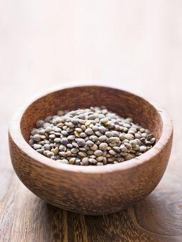 close up of rustic french green puy lentil