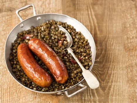 close up of rustic sausage with lentil