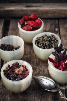 leaves of the tea bush,the stylish cups prepared for brewing