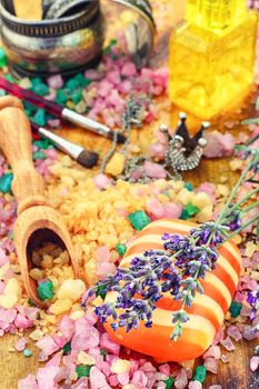 Different sea salt for baths and spas with branches of fragrant lavender.