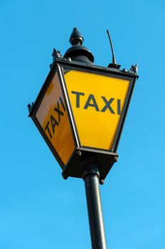 Vintage taxi sign in London, UK