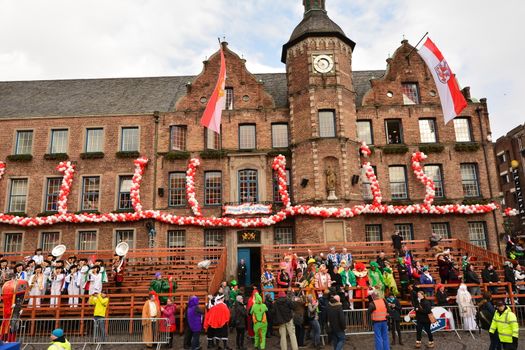 GERMANY, Düsseldorf: People gather in front of the city hall in Düsseldorf, western Germany, after the Rose Monday (Rosenmontag) street parade has been cancelled on February 8, 2016. Traditional Rose Monday carnival parades in several western German cities have been cancelled due to stormy weather.