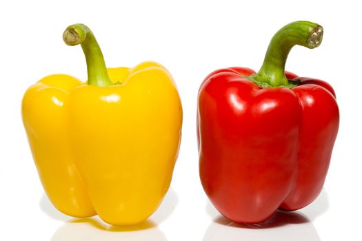 The photograph depicts peppers on a white background