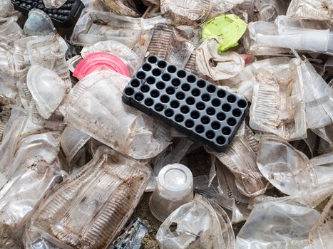 Plastic cups and containers prepared for recycling