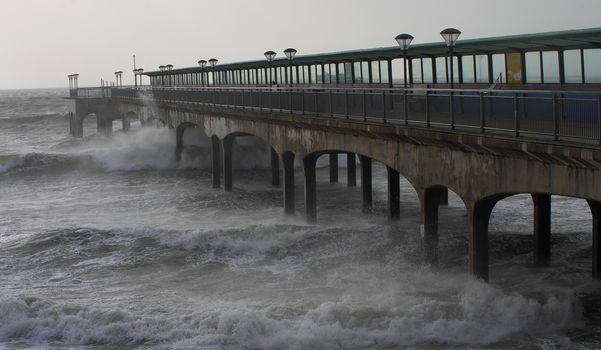 UK, Dorset: Waves crash on the south coast near Dorset as Storm Imogen batters the UK with winds reaching up to 80mph on February 8, 2016. With the UK on amber alert, gale-force winds and heavy rainfall have caused disruption to local train and ferry services. A 64-year-old inspector from the Royal Society for the Prevention of Cruelty to Animals reportedly went missing Sunday.