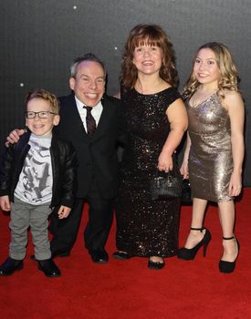 UNITED-KINGDOM, London :  English actor Warwick Davis poses for photographers while Star Wars cast, crew and celebrities hit the red carpet for the last episode The Force Awakens European Premiere on December 16, 2015 in central London.   	