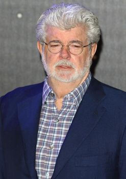 UNITED-KINGDOM, London : Star Wars creator George Lucas poses for photographers while Star Wars cast, crew and celebrities hit the red carpet for the last episode The Force Awakens European Premiere on December 16, 2015 in central London.   	