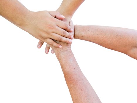 Seniors hands and young hands in unity on white background