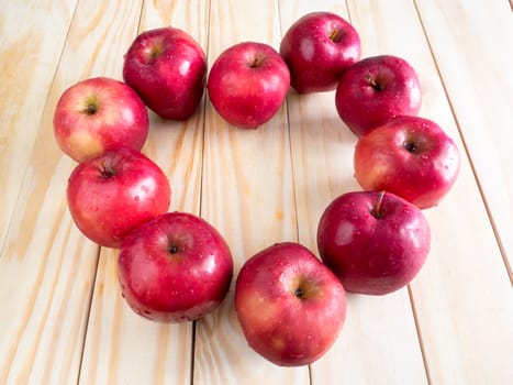 fresh red wet apples with water drops