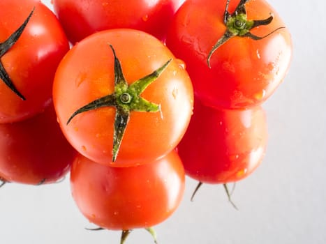 Fresh tomatoes on the mirror