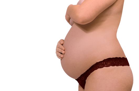 Portrait of pregnant belly of very young teenager