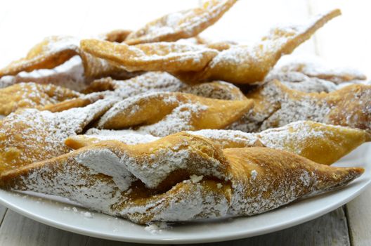 Chrust (faworek) funnel cake - Polish fried cookie (a kind of cracknels) with powdered sugar.
