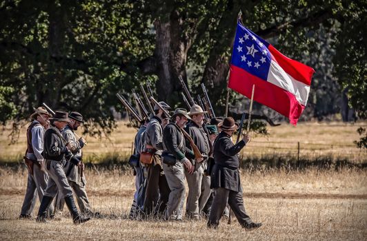 Confederate troops march towards the Union Army during a Civil War reenactment in Anderson, California.
Photo taken on: September 27th, 2014
