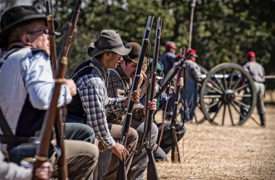 Confederate troops prepare to fire  on the Union Army during a Civil War reenactment in Anderson, California.
Photo taken on: September 27th, 2014