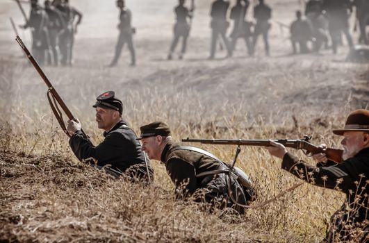 Union sharpshooters look for targets during a Civil War reenactment in Anderson, California.
Photo taken on: September 27th, 2014