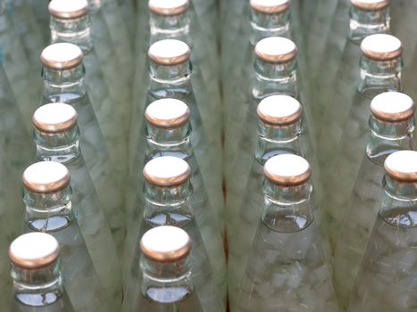 bottles of Nata de coco in syrup, select focus