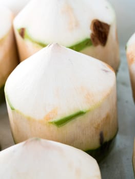 Fresh coconuts in the market,select focus