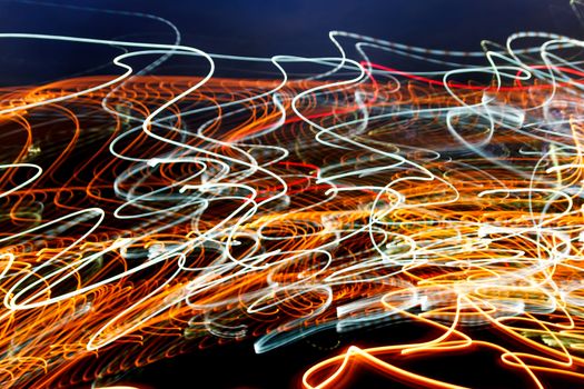 Abstract blur messy light trail.