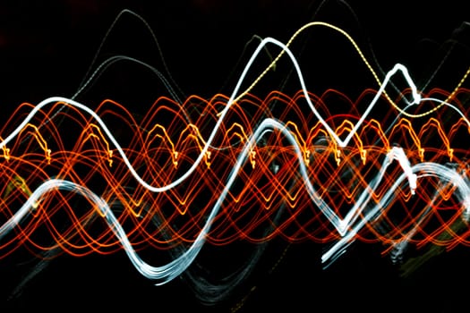 Abstract blur messy light trail.