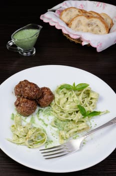 Meatballs with pasta sauce avocado,  parmesan and basil