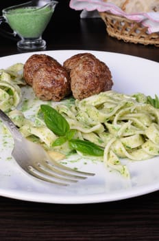 Meatballs with pasta sauce avocado,  parmesan and basil