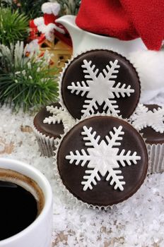 Chocolate Christmas Muffins decorated with marzipan pearl snowflake