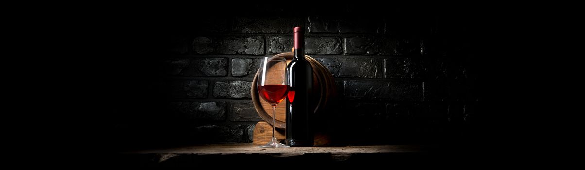 Red wine on a background of black bricks